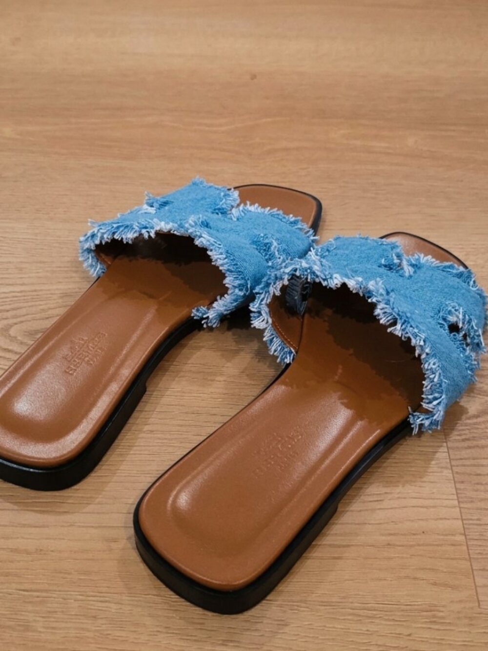 HERMÈS Denim Fringe Oran Sandals in Bleu Clair